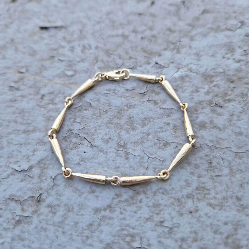 Kegle armbånd 14 kt guld.